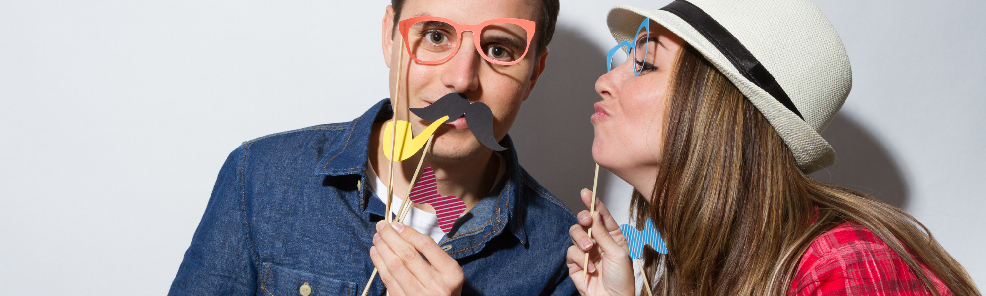 photo booth session with couple using props 